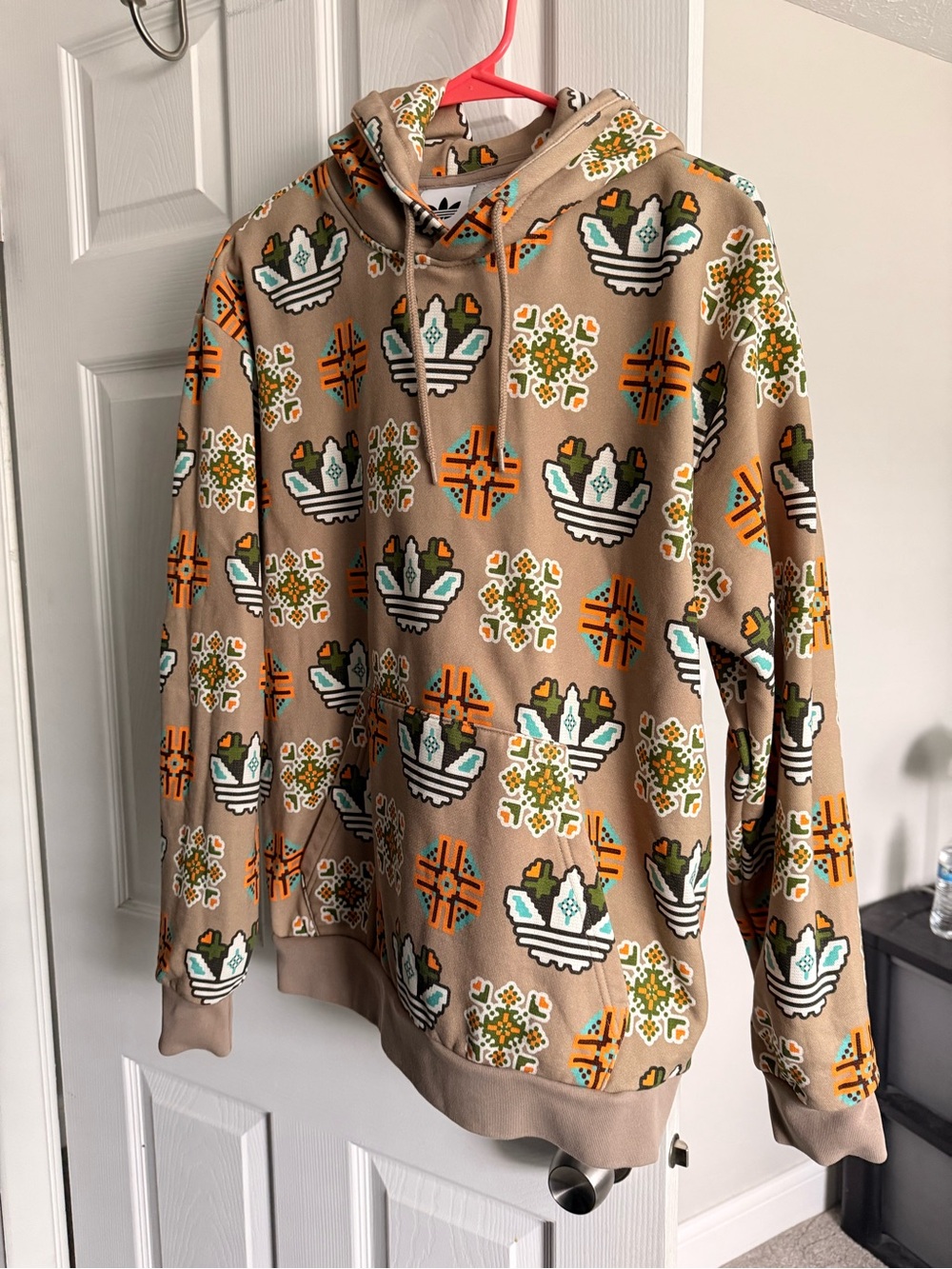 Adidas medium tan icon hoodie